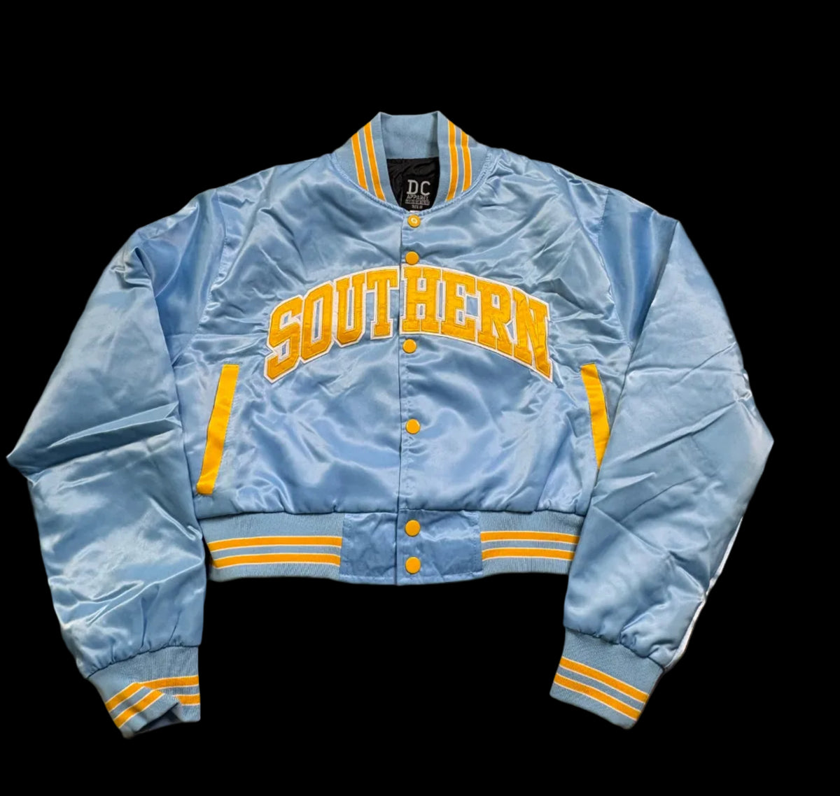 A light blue satin varsity jacket with 'SOUTHERN' in yellow block letters across the chest.