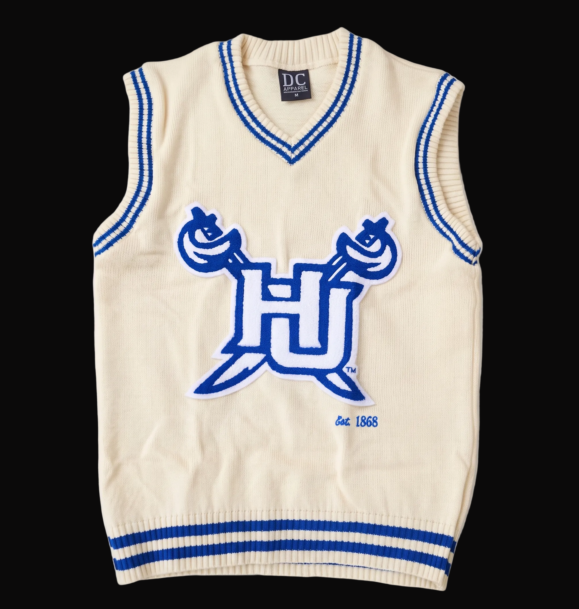 An off-white knit sweater vest with blue trim and a large blue 'HU Hampton' logo with crossed bats on the front, laid flat against a light cream background.